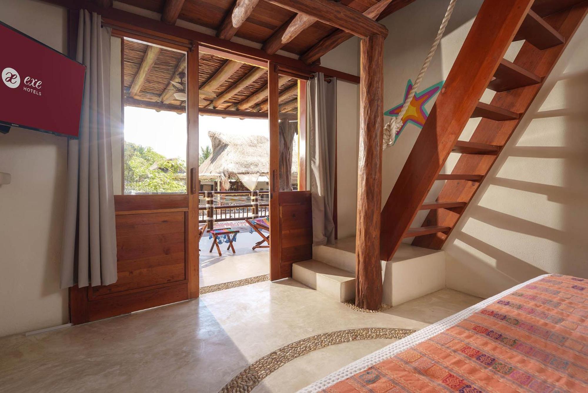 Готель Exe El Pueblito Isla Holbox Екстер'єр фото